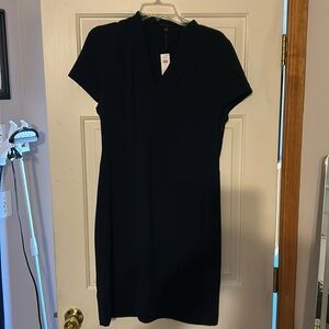 Navy blue dress NWT. Size 12. Side zip. Great for work!